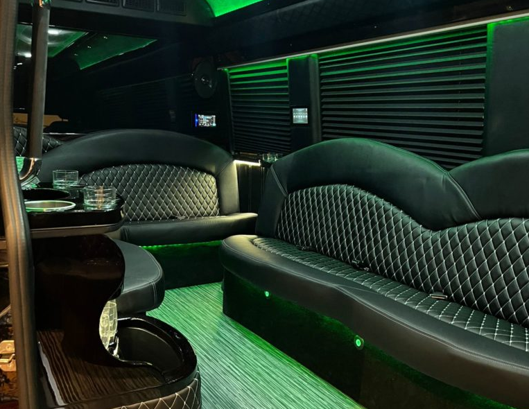 Castle Rock Limo Services 6 Interior of Limousine showcasing elegant black seats and refreshment area.
